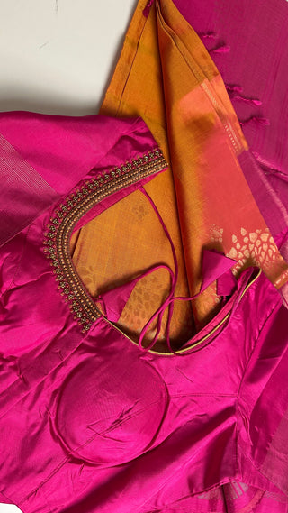 Elegant yellow and pink pure soft silk saree with double ply handloom weave, smooth drape, and rich traditional detailing, perfect for bridal wear.
