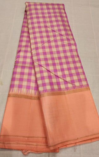 Pastel pure kanjivaram  silk checks saree with hand embroidered blouse