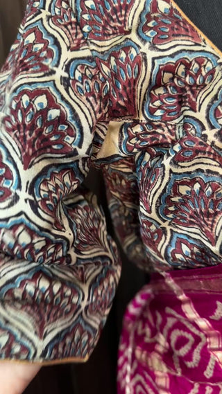 Soft pink Bandhini silk saree with hand block Ajrakh prints, ideal for weddings.