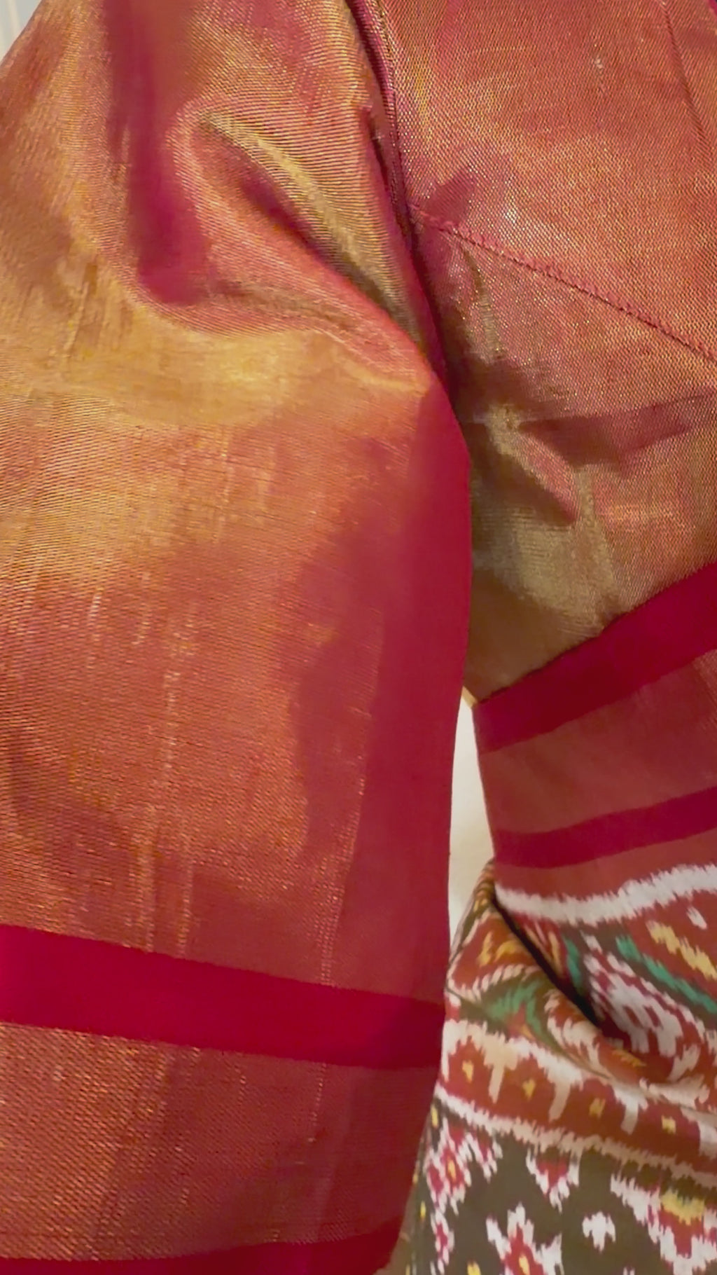 Classic Patola silk saree with rich gold pallu, double ikat weaving, and luxurious finish, perfect for weddings and cultural events.