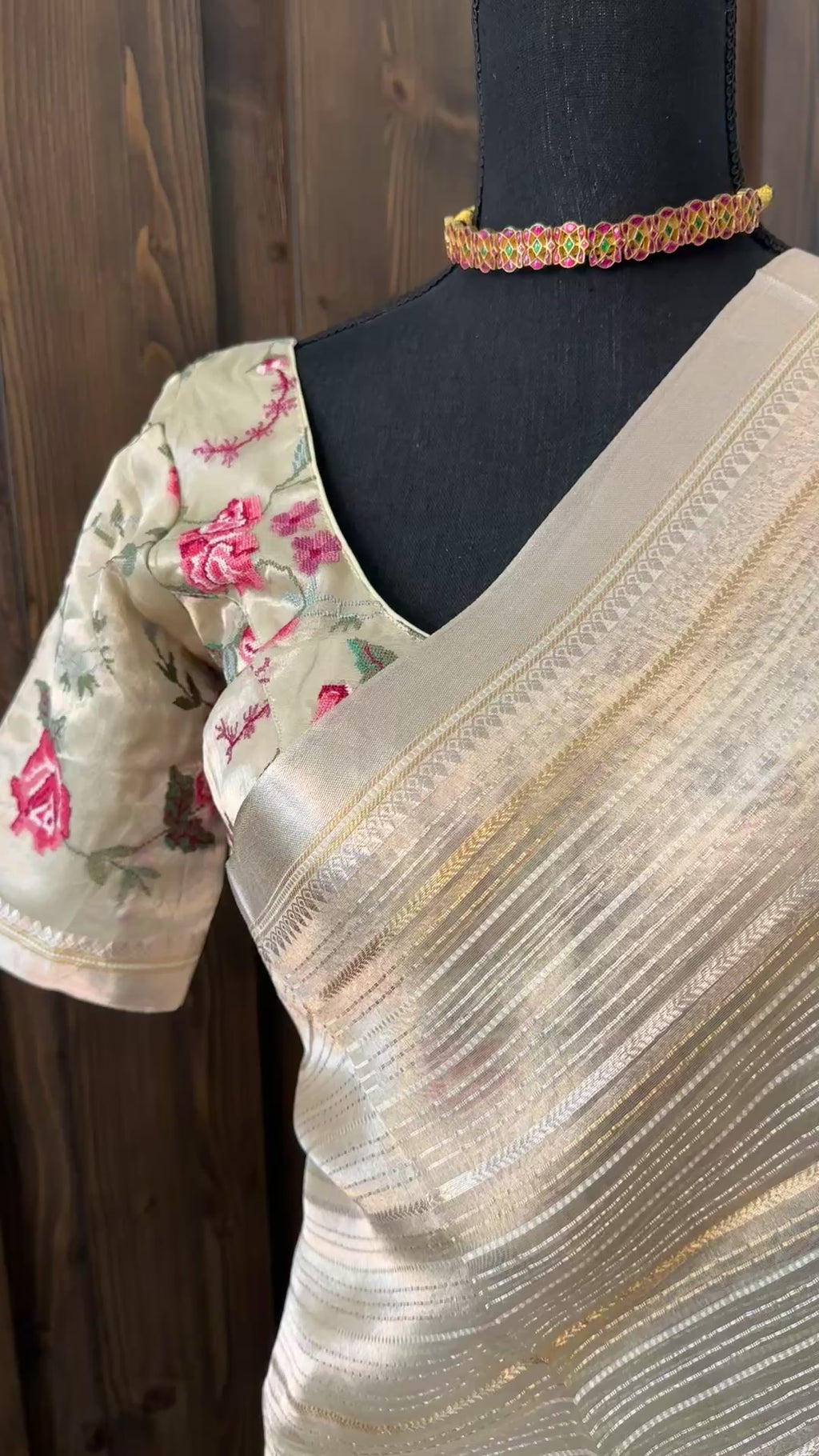 Soft organza tissue saree in beige gold, ideal for partywear with embroidered blouse.