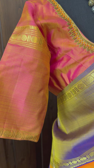 Handloom yellow Kanjivaram silk saree crafted with gold threadwork and zari design.