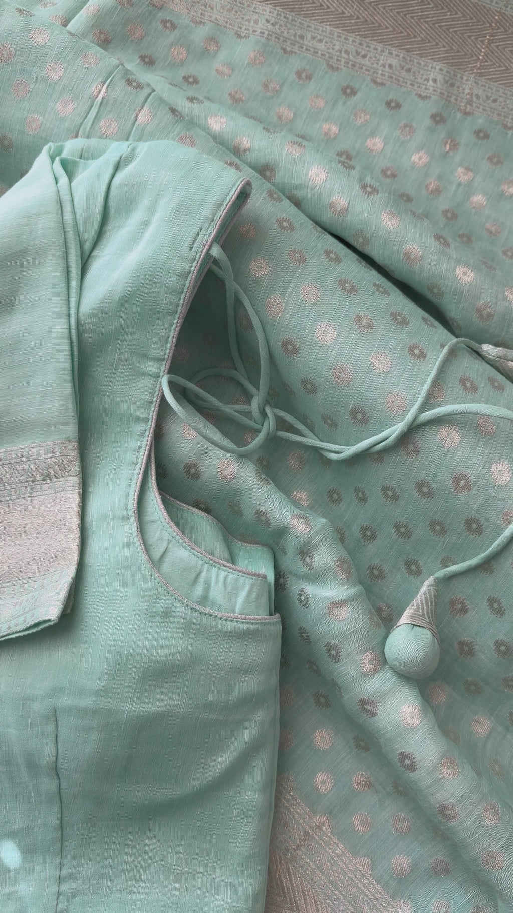 Handloom pastel cyan Banarasi linen saree with silver border and pre-stitched blouse