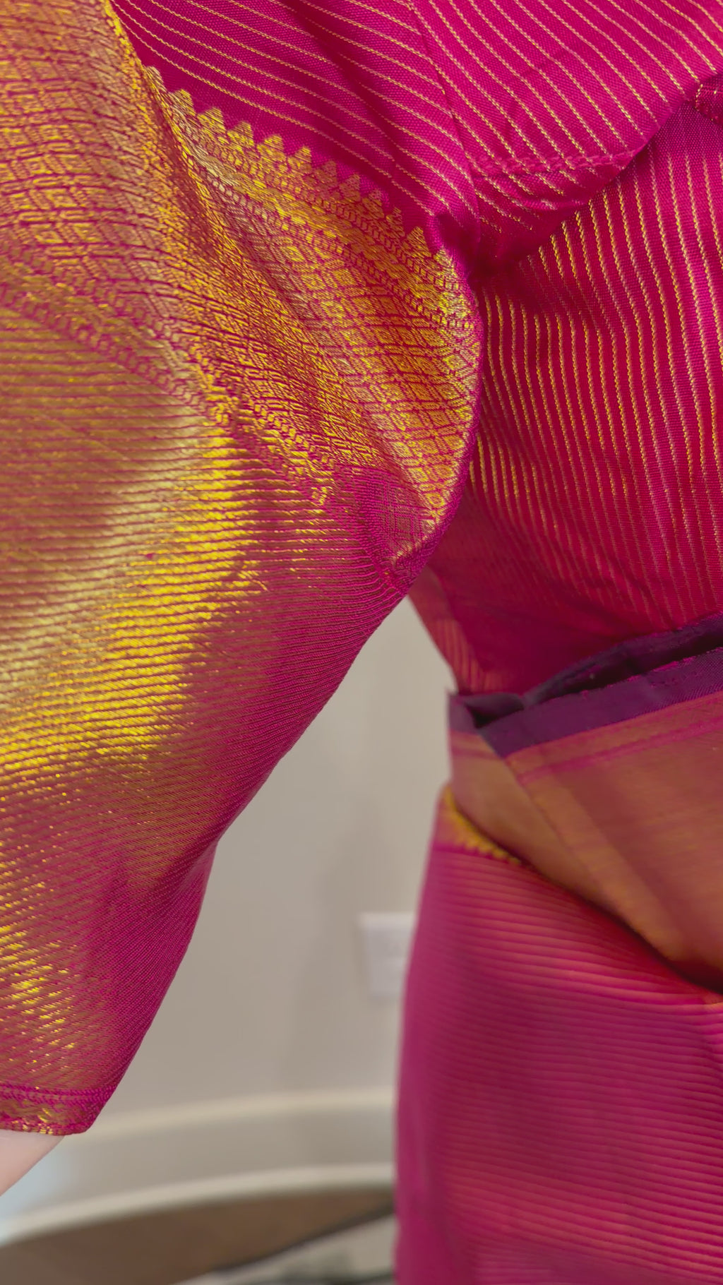 Bridal dark pink vaira oosi kanjivaram pattu saree with intricate zari weaving and classic temple motifs