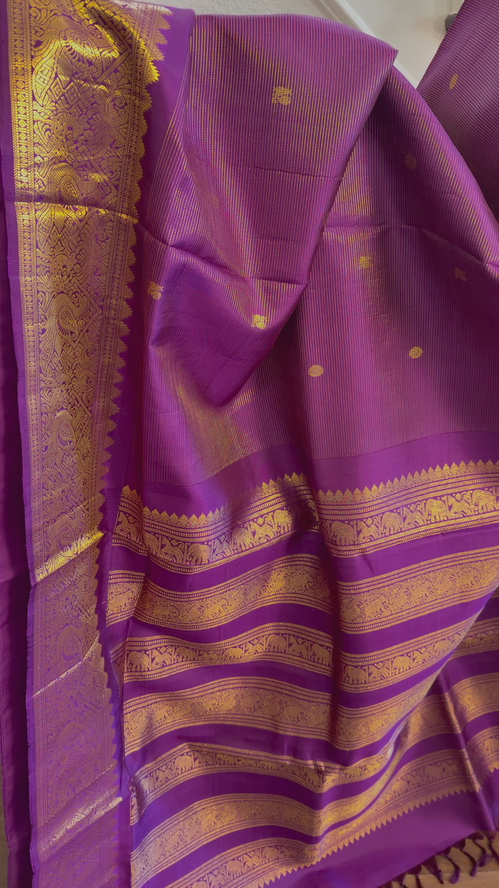 Pure kanjivaram purple silk saree featuring fine zari weave with prestitched blouse size 36–42