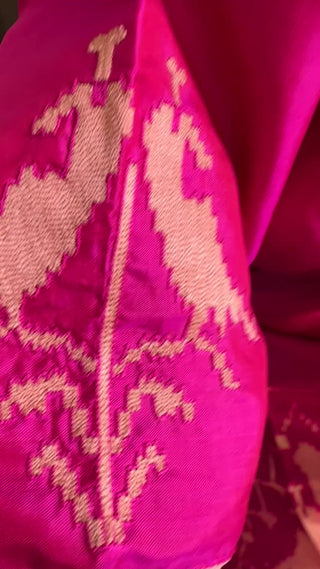 Stunning pink pure silk Patola saree with pre-stitched padded blouse, ideal for wedding and festive wear.