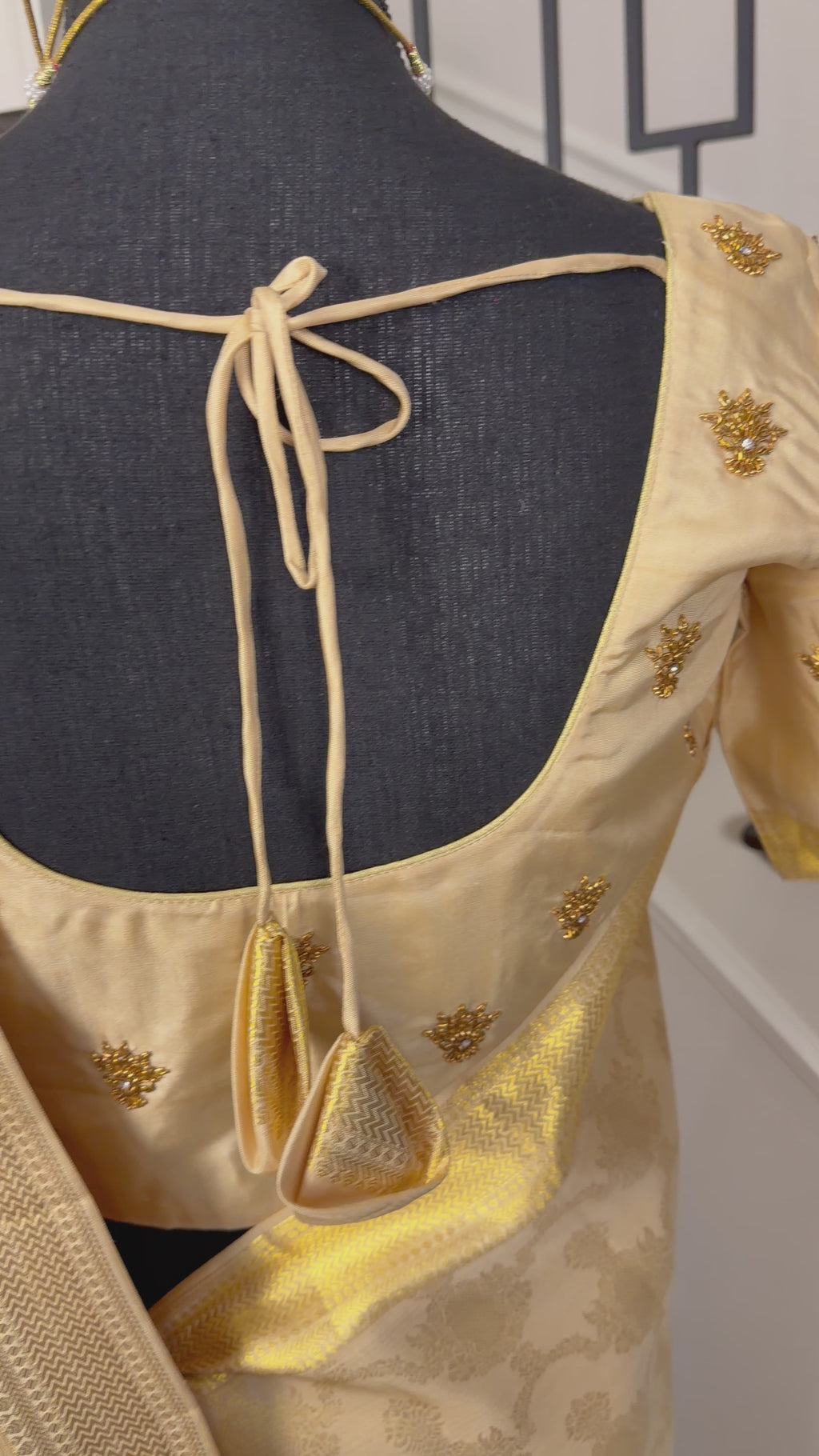 Gold Kanjivaram silk bridal saree with antique zari border and embroidered blouse for Pellicheera Pellikuthuru ceremony