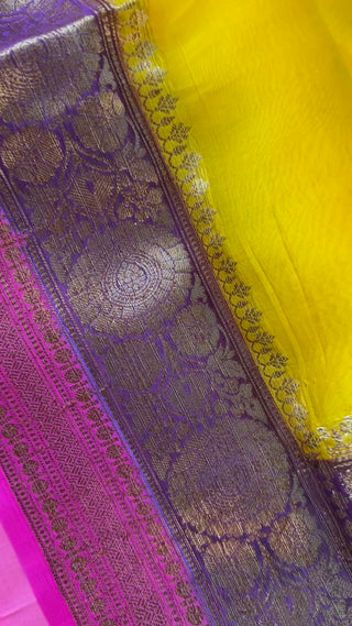 Designer Banaras Organza Saree with Transparent Drape Beautiful transparent Banaras organza silk saree in yellow pink with golden zari and ready blouse, ideal for elegant party looks.