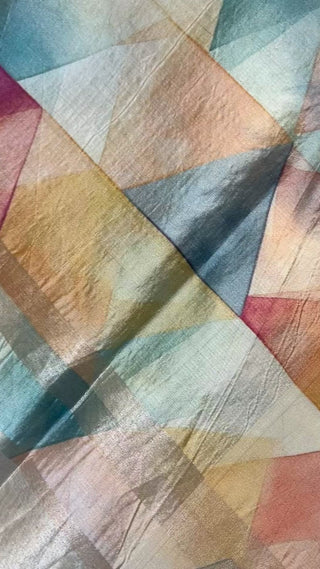 Handwoven tissue organza saree in soft cream tone perfect for festive wear