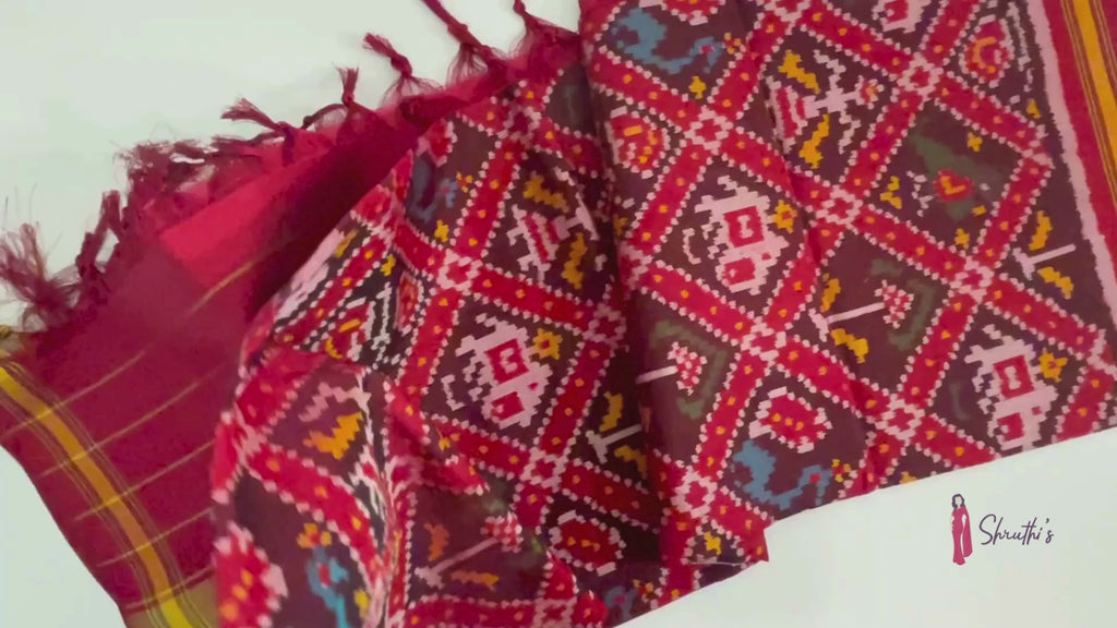 Authentic Patan Patola pure mulberry silk dupatta featuring red base with ikat elephant motifs.