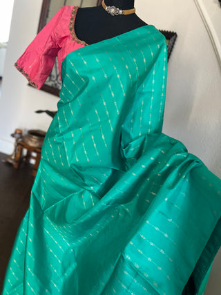 Borderless salmon pink teal with silver  zari pure kanjivaram