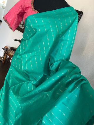Borderless salmon pink teal with silver  zari pure kanjivaram