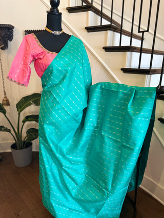 Borderless salmon pink teal with silver  zari pure kanjivaram