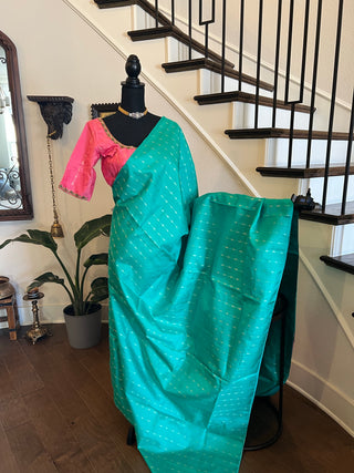 Borderless salmon pink teal with silver  zari pure kanjivaram